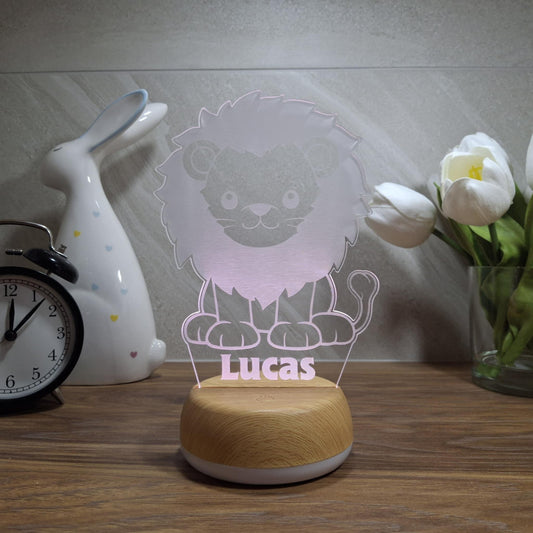 Personalised lion night light turned on at night – cosy lighting for nursery or playroom