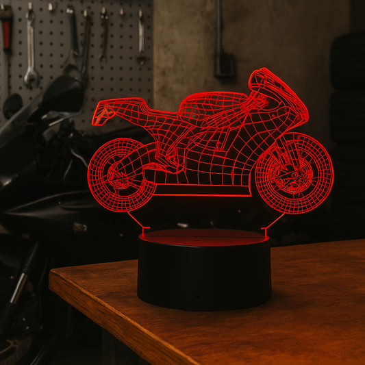 Motorcycle-shaped lamp on a table with tools in the background