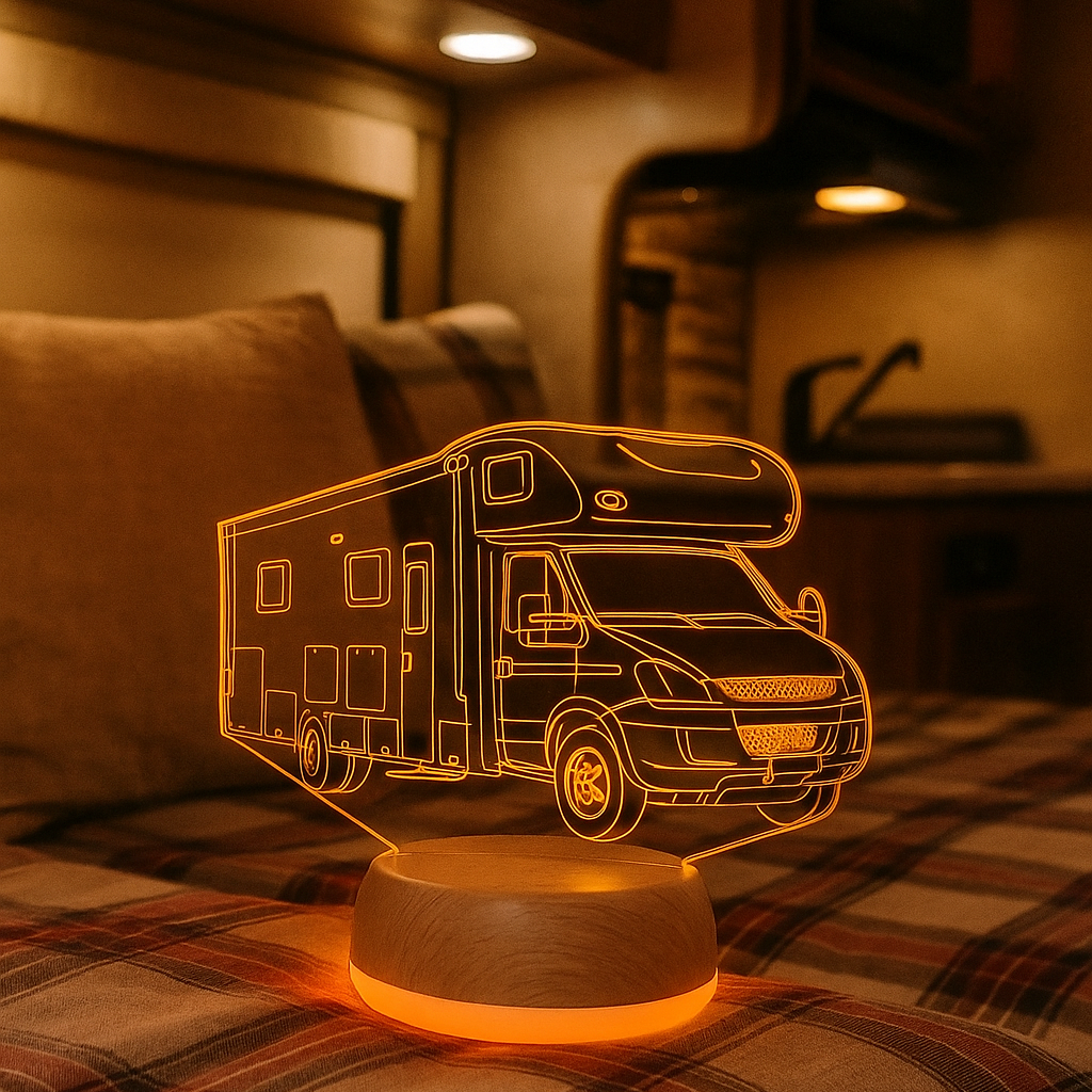 Camper-shaped night light on a plaid surface with a warm glow