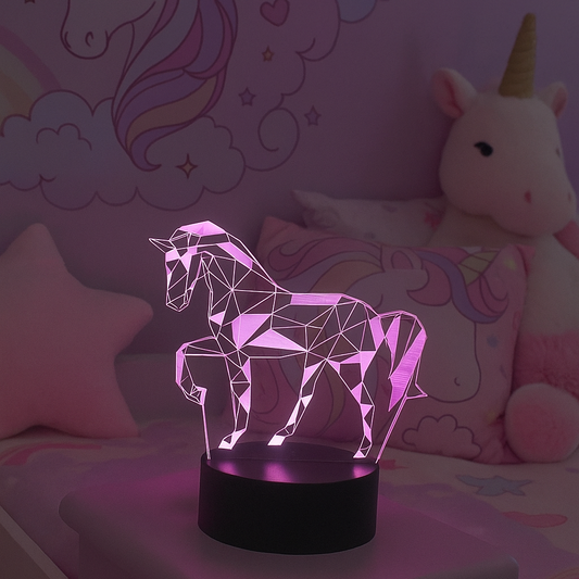 Unicorn-themed night light on a bedside table with plush toys and decorative wall art in the background.